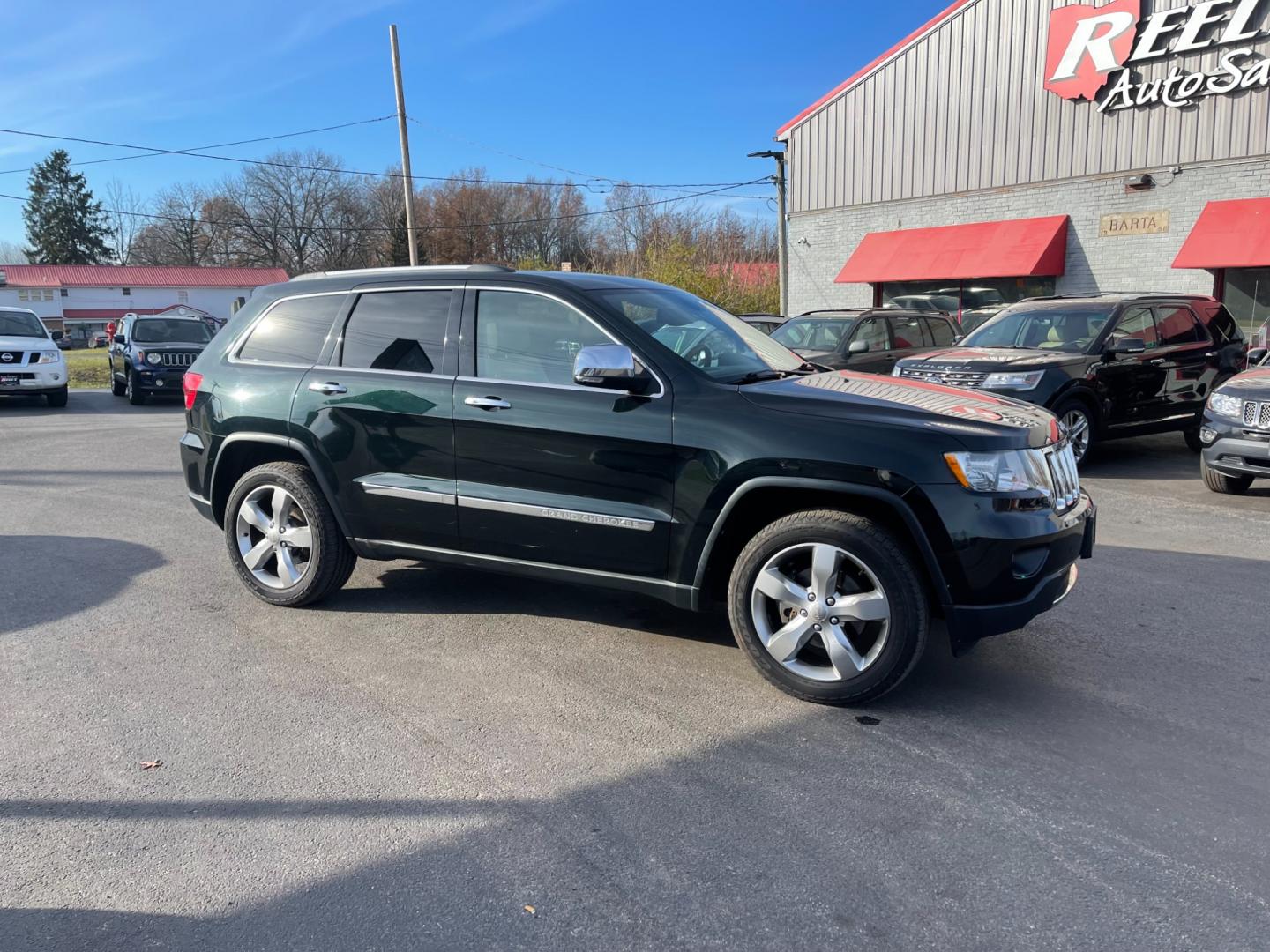 2013 Black /Gray Jeep Grand Cherokee (1C4RJFCG5DC) , located at 547 E. Main St., Orwell, OH, 44076, (440) 437-5893, 41.535435, -80.847855 - Photo#4